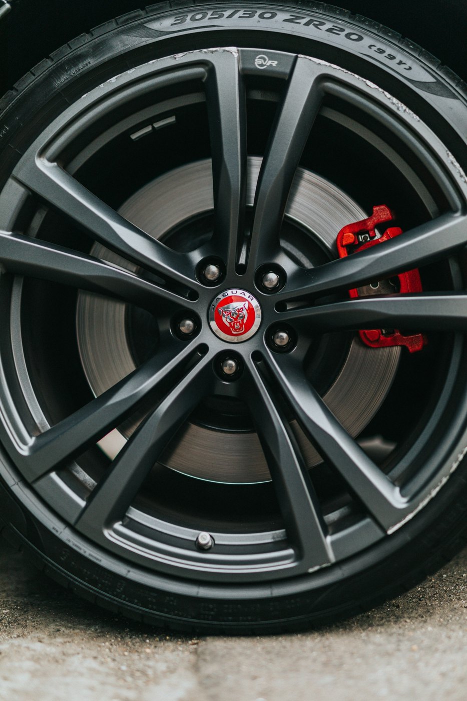 Illustrative close-up of an alloy wheel and brake assembly
